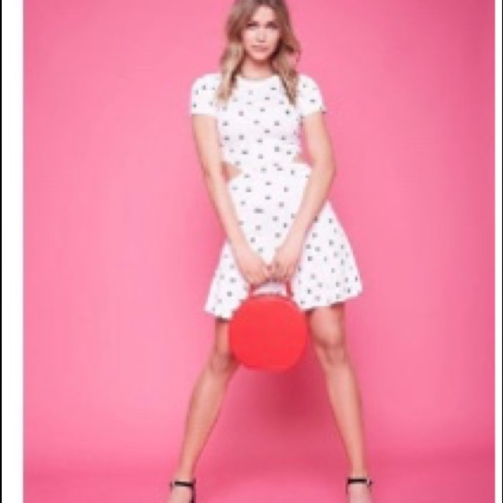 Short polka dot open cut dress